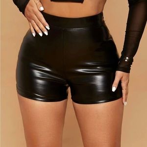 Black latex/ leather shorts